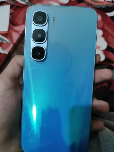 Infinix Hot 60 Pro used 10/10 condition. Contact in description & chat