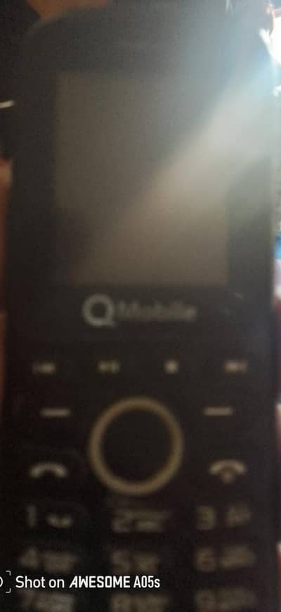 QMobile bas lcd parny wali ha 250 ki 202 shop sa par jy gi