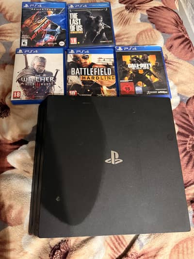 Selling Playstation 4 pro (PS 4 pro) 1TB space 10/10, 5 games