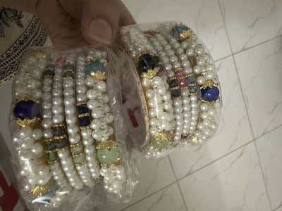 Pearl and stone bangles