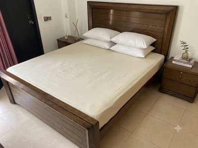 Double bed with side table