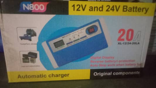 Osaka battery 12v 100 ah brand new and charger 12v 20 amp