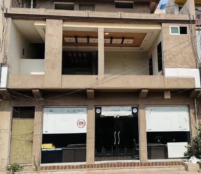 Direct Deals Marketing Offers Prime Location Beautiful Double Storey Commercial Building Available For Sale Reasonable Price on Gate no 1 On Main Boulevard Al Rehman Garden Phase 2 Saggian Bypass