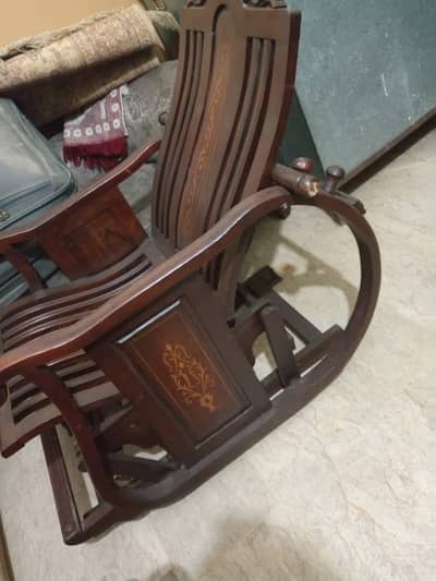 Wooden swinging chair
