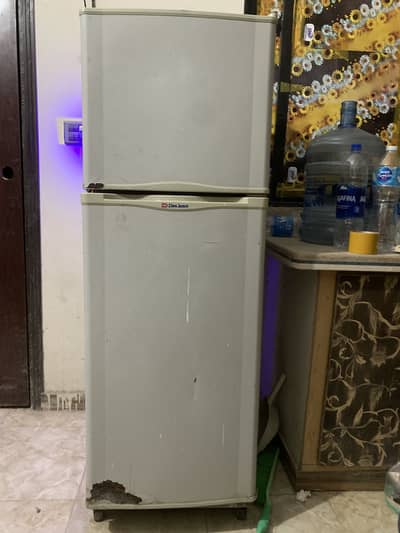 Used dowlance refrigerator in good condition only gass is needed
