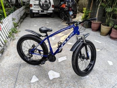 Sparingly used PLUS branded Fat Boy bicycle for sale