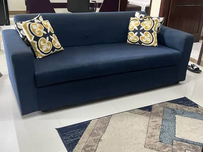 6 seater sofa with glass top table