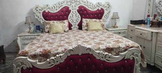 we are selling a velvet wooden bed