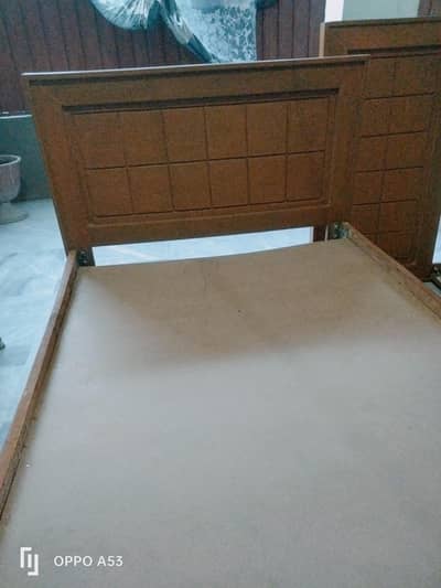 two new single wooden beds for sale