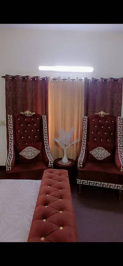 Two sofa chairs, one round table,