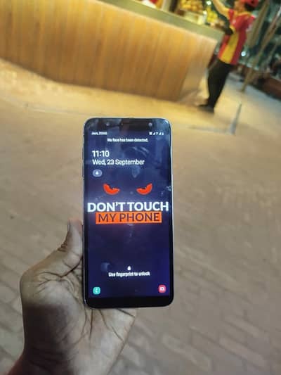 Samsung Mobile J8