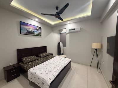 Daily Basis Apartment & Rooms Per day Perweek Short stay Available in E-11 Islamabad