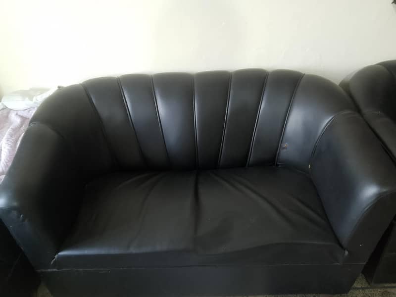 black leather sofa set. 0