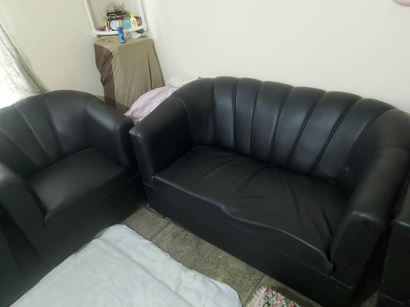 black leather sofa set. 3