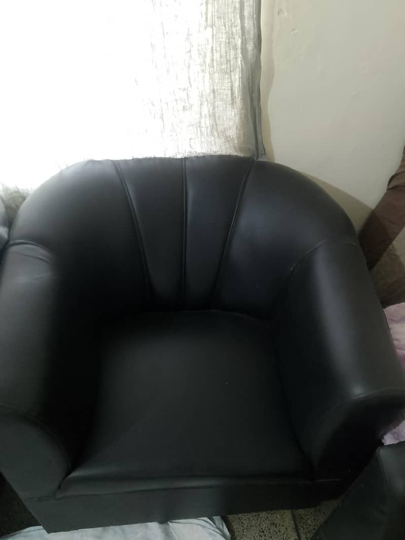 black leather sofa set. 4