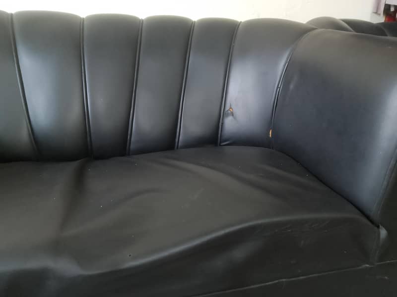 black leather sofa set. 5