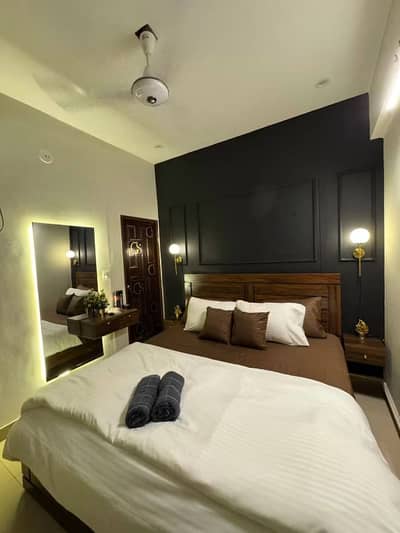 Daily Basis Apartment & Rooms Per day Perweek Short stay Available in E-11 Islamabad