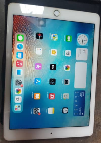 Apple iPad a1567 with original box and charger, neat and clean