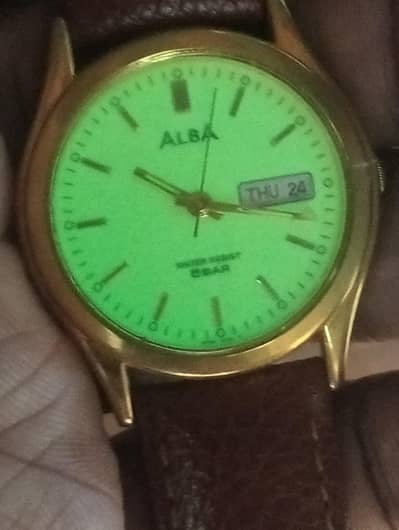 Seiko Alba day and date watch glowing dial brown leather strap