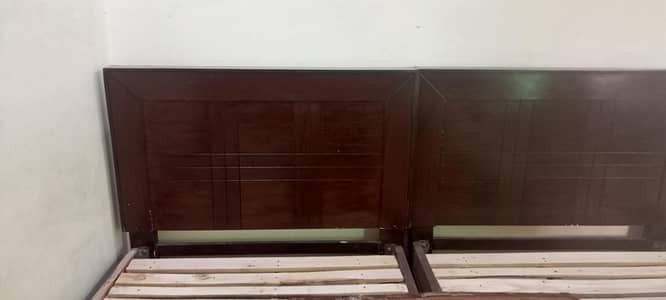 urgent sell 2 single bed with out mattress