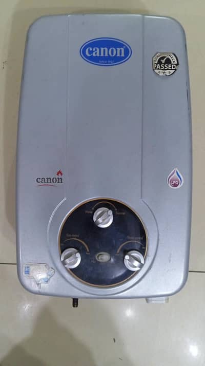 Canon instant gyser new condition 100%