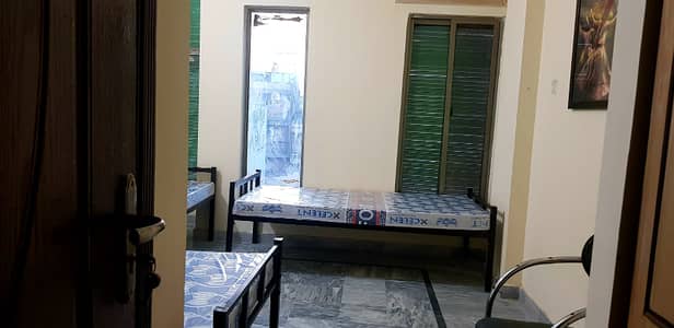 A spacious **3-Story Commercial House** is available for rent in a prime and busy location of Commercial Market, Satellite Town.