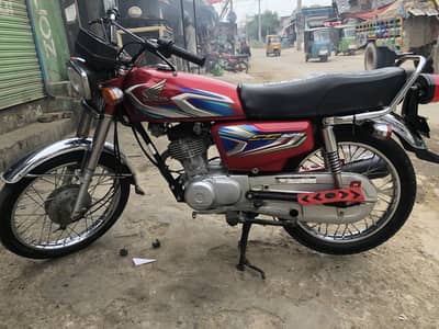 Honda 125 Red Colour Clear Document