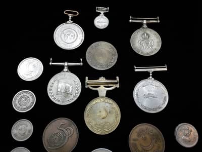 RARE & ANTIQUE COLLECTIBLE COINS & WAR MEDALS