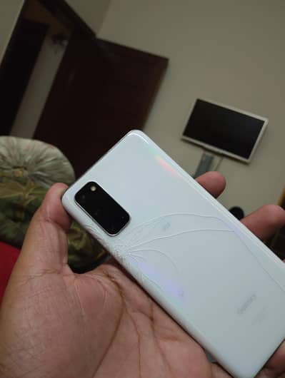 Samsung Mobile S20. back and front break. line