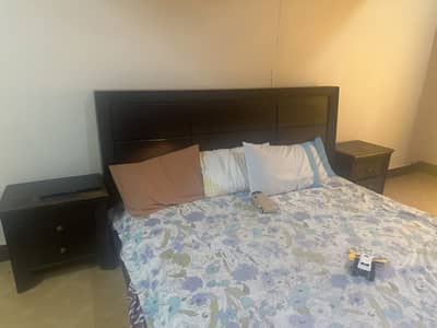 Solid wood bed set with mattress.