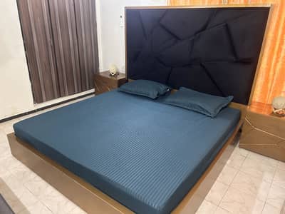 Wooden bed with vanity