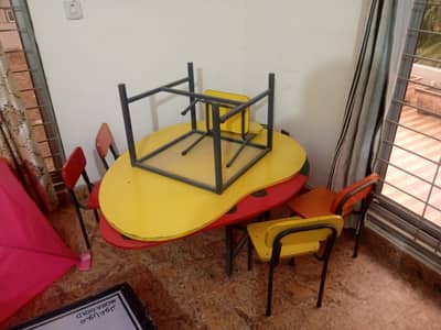 2 Kids/school table and 7 chairs
