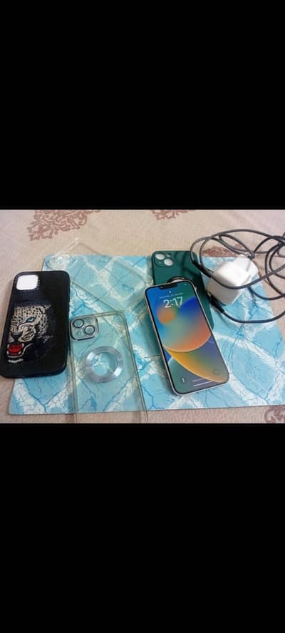 Apple iPhone 13 with charger