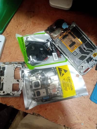 OnePlus 12 parts available okay board hai pta approved