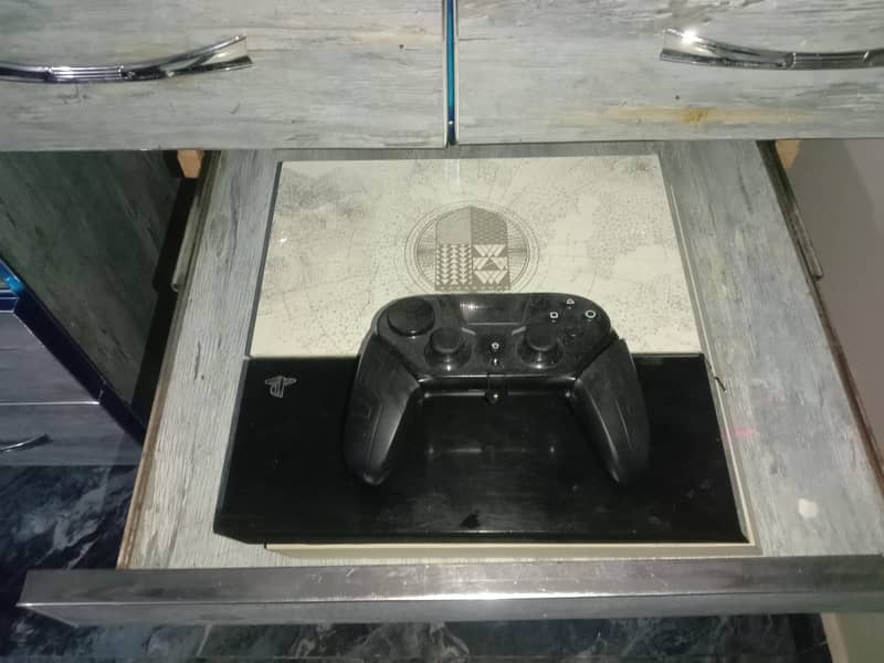 PS4 1TB WITH ADDITIONAL ITEMS 3