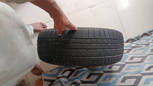 Tyre with alloy rim