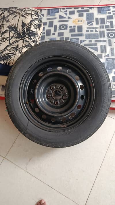 Tyre with alloy rim