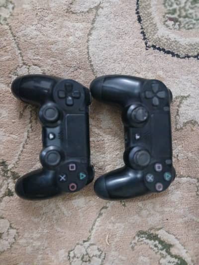 PlayStation 4 orignal two controllers for sale