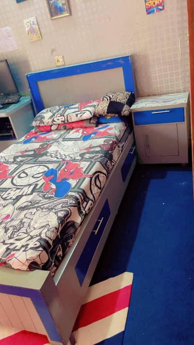 Single bed with one side table