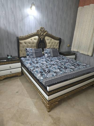 Bed with two side tables