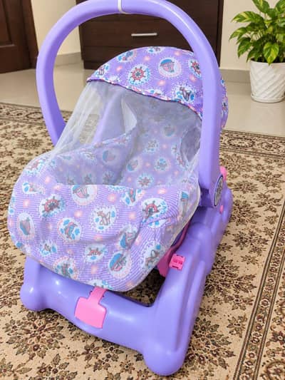 swings , slides and seat adjustable carry cart.