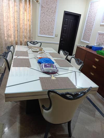 8 Feet x 4 Feet  dining glass table with 10  chairs