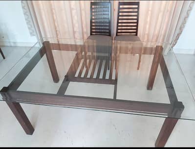 Glass top dining table
