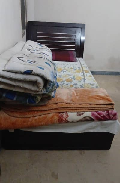 Wooden single bed