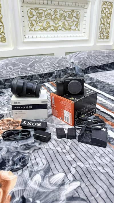 sony A6400 with sigma 16mm/1.4 with box