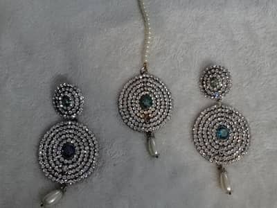 silver with blue centre