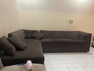 Dark brown colour 9/10 condition sofas with table