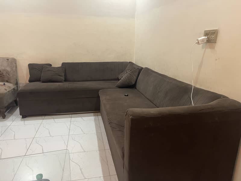 Dark brown colour 9/10 condition sofas with table 1