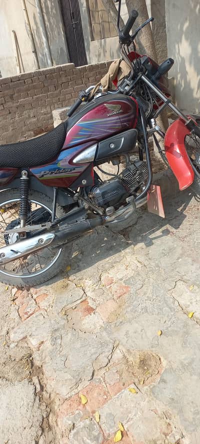 Honda prider 100cc03336861390