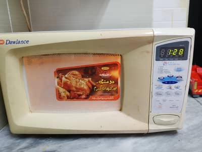 Dawlance microwave oven ok condition 10 by 9